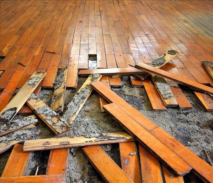 Wooden tiles damaged by water