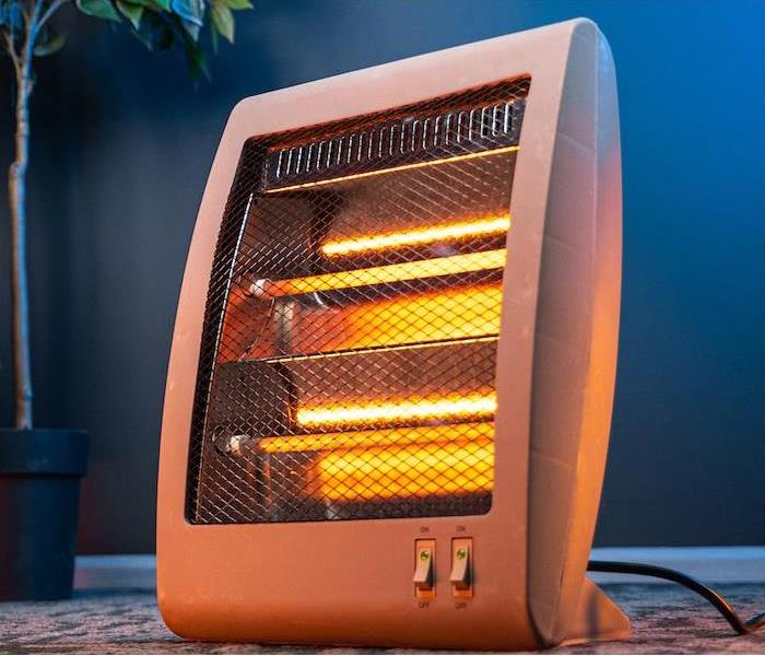 a small electric heater in a living room